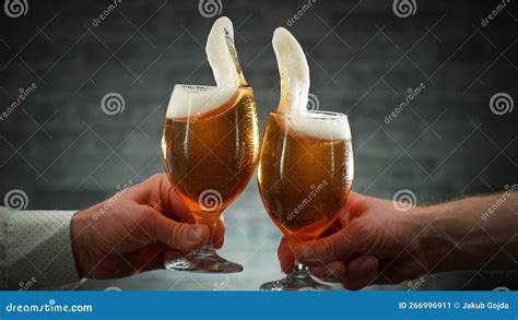 Two Glasses of Beer in Cheers Gesture, Splashing Stock Image - Image of cold, golden: 266996911