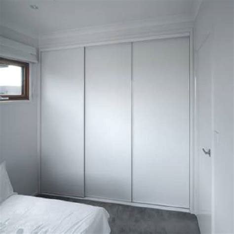 DIY Sliding Wardrobe Doors With White Melamine Panels And White Frames