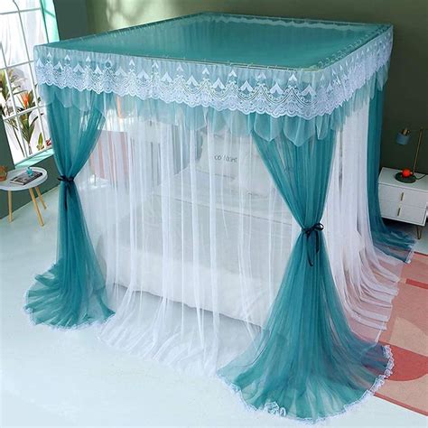 A Canopy Bed With Sheer Curtains And Lace