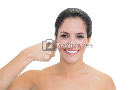 Smiling Bare Brunette Touching Her Nose By Wavebreakmedia Vectors