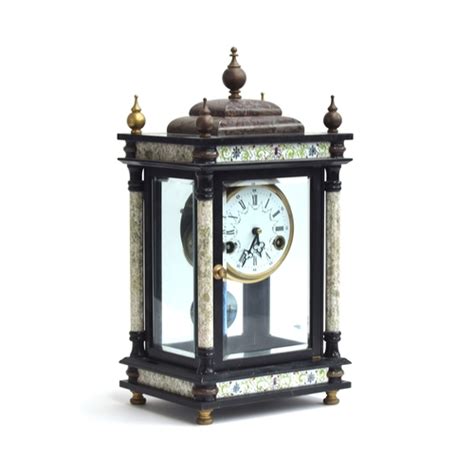 A Th Century French Slate And Marble Mantel Clock The Case With Four