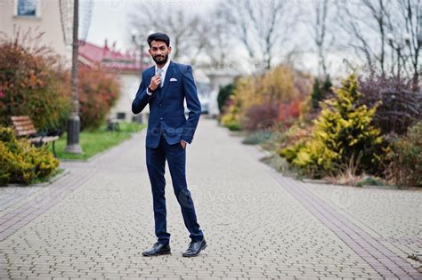 Stylish Beard Indian Man With Bindi On Forehead Wear On Blue Suit