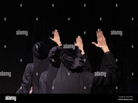 Female Members Of The Khishtan Performance Group Perform In A Play To