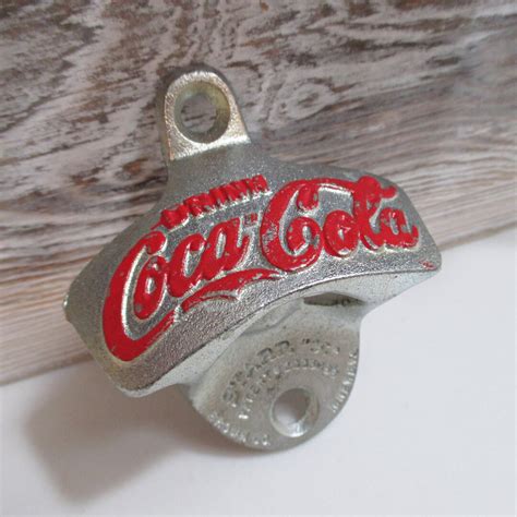 Vintage Brown Mfg Co Starr X Coca Cola Stationary Wall Mount Bottle