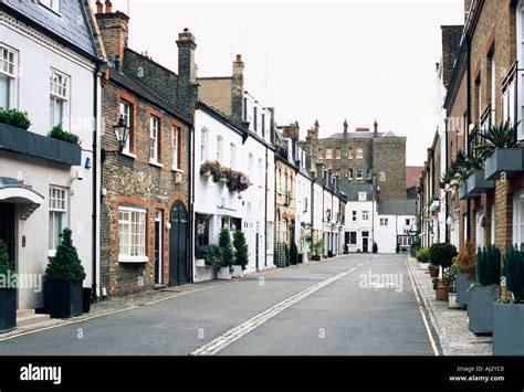 Typical Houses In Mews Style Street Kensington London Uk Stock Photo