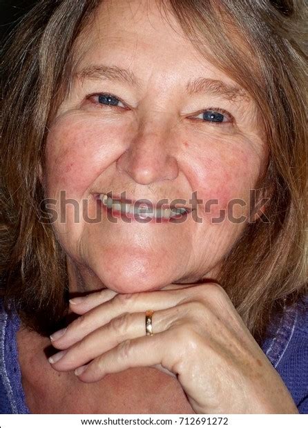 Mature Female Blond Beauty Expressions Indoors Stock Photo