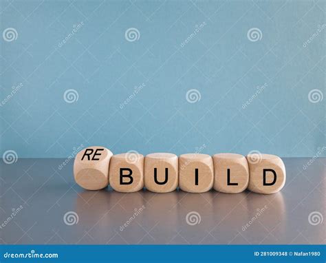 Time To Rebuild Symbol Turned Wooden Cubes And Changes The Word Build