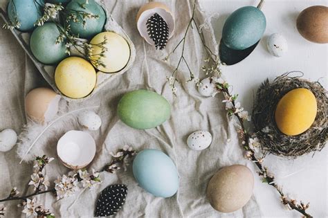 Premium Photo Stylish Easter Eggs And Cherry Blossom On Rustic Linen