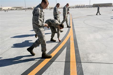 Al Udeid Airmen Conduct First Fod Walk On New Tactical Ramp U S Air