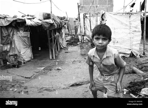 Environmental Portrait Of A Boy In A Slum Squatter Village In Kathmandu