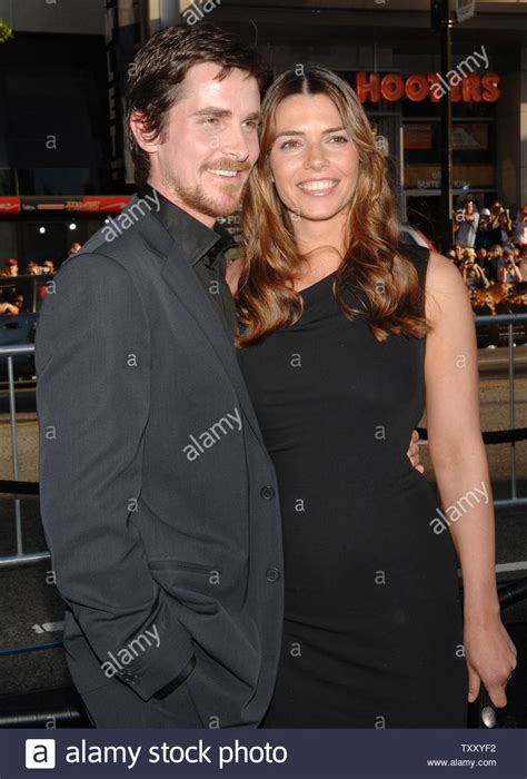 Actor Christian Bale And His Wife Sibi Blazic Arrive For The Premiere Of Batman Begins June