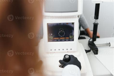 Modern Medical Equipment Close Up Of Ophthalmologist Using Auto