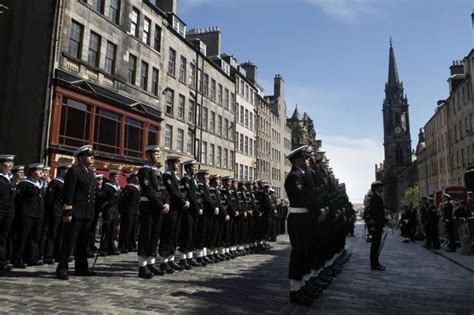 Hundreds line the streets of Edinburgh today (17 May 2013) as the ship ...