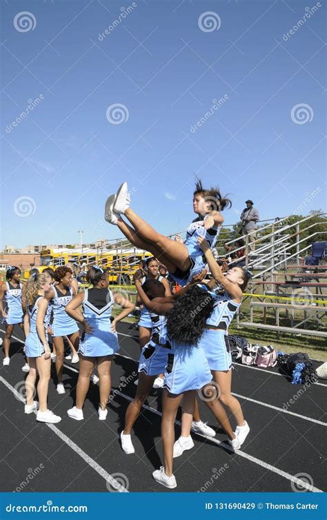 Cheerleaders Perform At A Football Game In Greenbelt Maryland