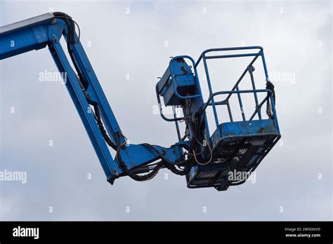 Extendable Cherry Picker With Hydraulic Arm And Close Up On Cradle With