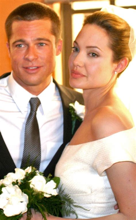 See Photos Of Angelina Jolie And Brad Pitt On Their Wedding Day And