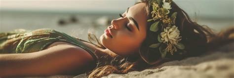 Premium AI Image Closeup Of A Girl Lying On The Sand In A Green Bikini And A Flower Crown And