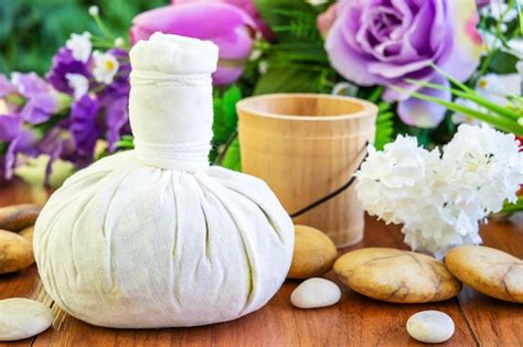 Premium Photo Thai Spa Massage With Herbal Compress Ball