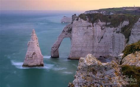 Arch Porte d'Aval and L'Aiguille - the Needle with the Porte d’Amont arch in the distance. Cote ...