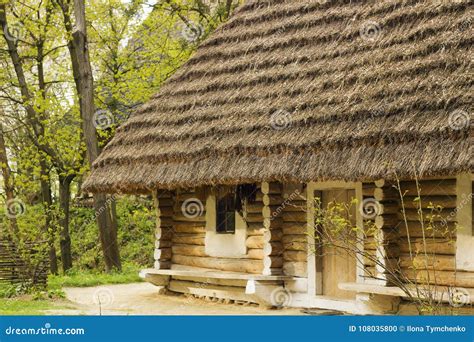 Old Wooden House With Thatched Roof In Village Stock Photo Image Of