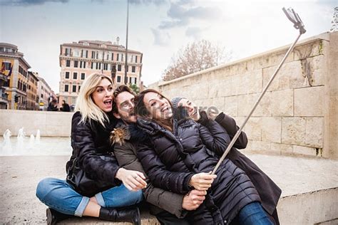 Group Of Happy Friends Taking A Selfie