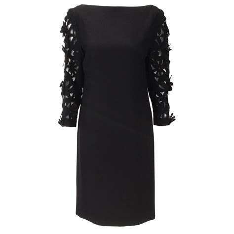 The little black dress by Chanel black and white silk Sculpted figure