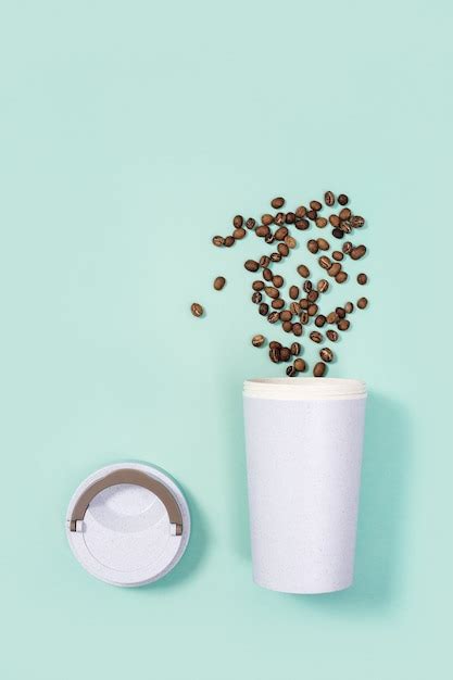 Premium Photo Reusable Eco Coffee Cup With Roasted Coffee Beans