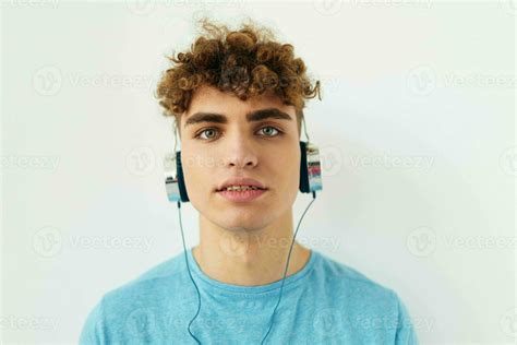 Kinky Guy In Blue T Shirts Headphones Fashion Isolated Background