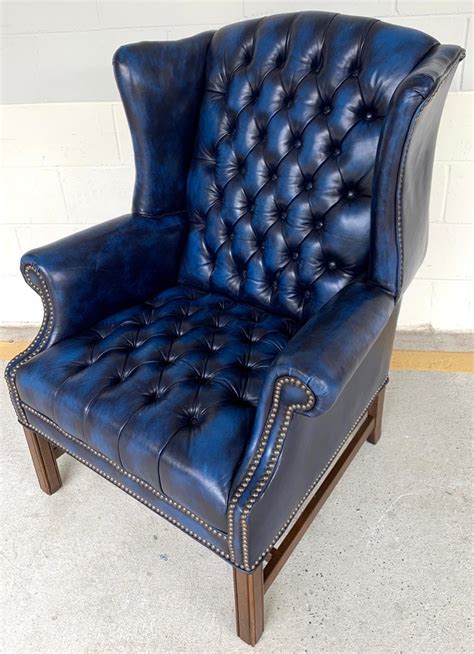 Pair Of English Hollywood Regency Blue Leather Wing Back Chesterfield