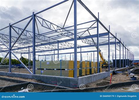 Steel Structure Framework Building And Stacks Of Sandwich Panels For