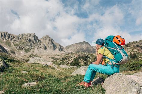 Blonde Woman Hiking In The Pyrenees Mountains By Stocksy Contributor