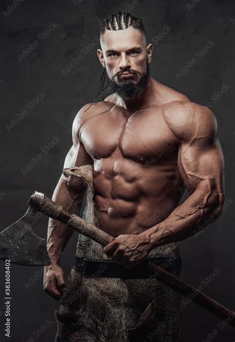 Muscular And Furious Bearded Viking Barbarian With Naked Torso And