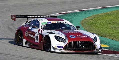 A Mercedes Sports Car Driving On A Race Track