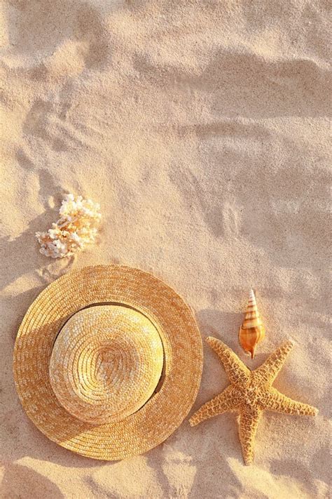 Flat Lay Composition With Starfish And Straw Hat On Sandy Beach Stock