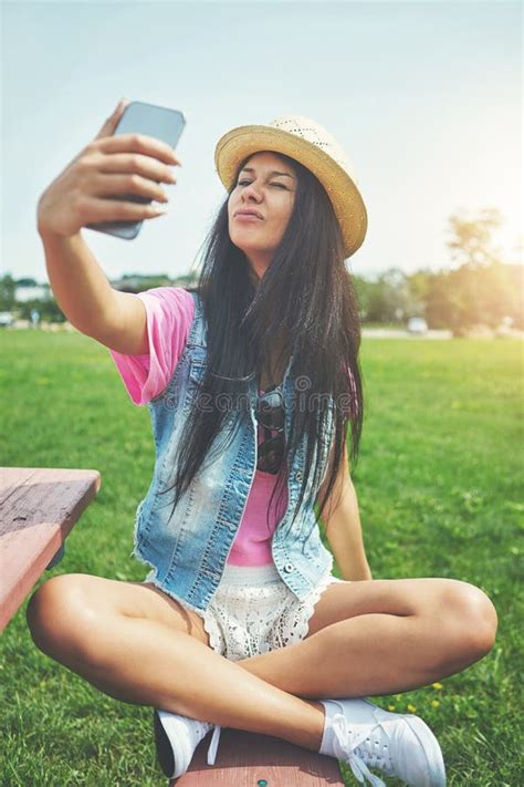 She Takes All Types Of Selfies An Attractive Young Woman Taking