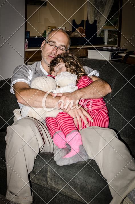 Father Comforting His Daughter Photos By Canva