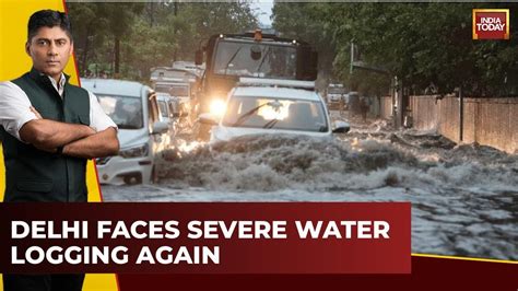 Rain Pounds Delhi Ncr Red Alert Massive Jams After Waterlogging