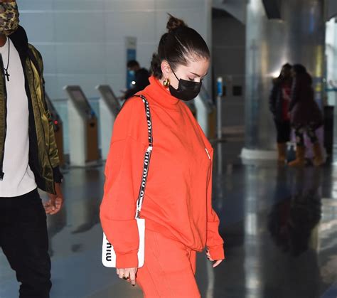 Selena Gomez In All Orange At Jfk Airport In New York 11 22 2021