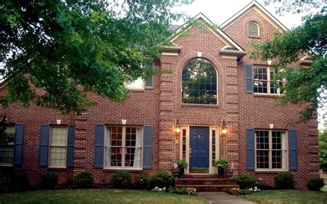 The 6 Best Shutter Colors For Brick Houses In 2024