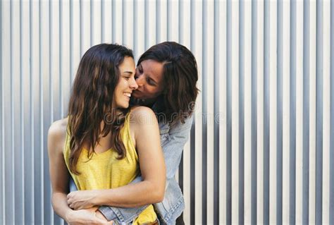 Affectionate Woman Kissing Her Happy Girlfriend Smiling Same Sex