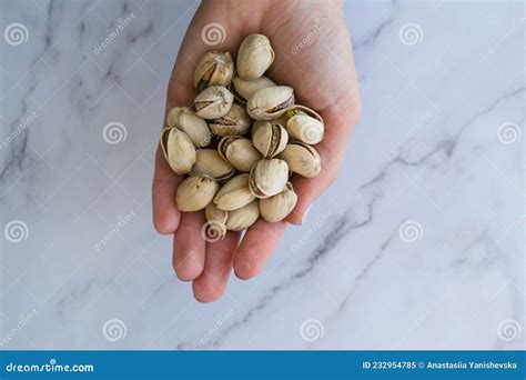 Woman Hands Holding Pistachio In Shell Nuts Healthy Food And Snack