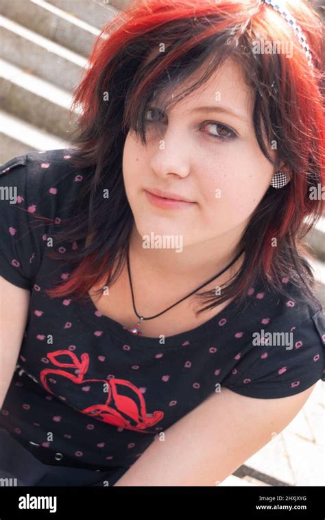 Punk Emo Girl Young Adult With Black Red Hair Looking At Camera Close Up Horizontal Stock