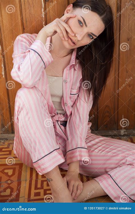 Beautiful Woman In Pink Pajamas Fashion Bedroom Portrait Stock Image