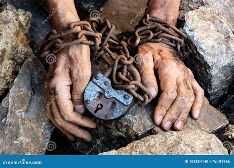 Slave Chained To Wall