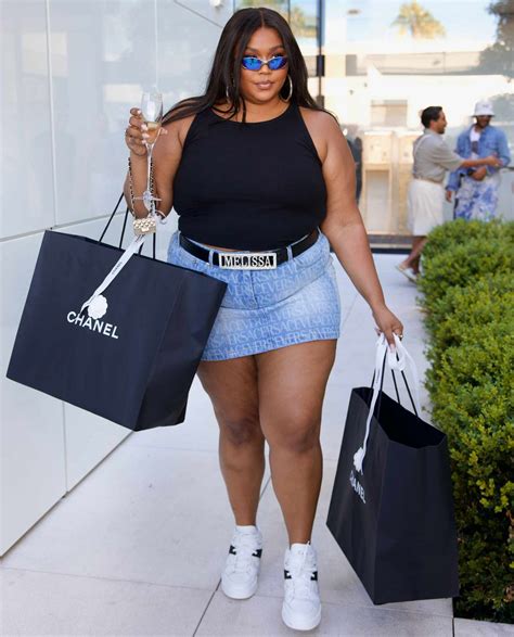 Lizzo Goes On Chanel Shopping Spree With Champagne Amid Controversy