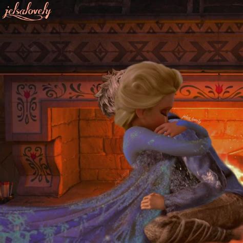 The Frozen Princess And Prince Hugging In Front Of A Fireplace