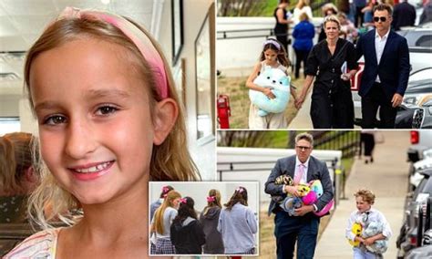 Mourners Wear Pink Bows At Heartbreaking Funeral Of Nine Year Old Girl