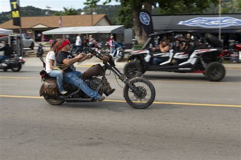 Woman Rider Sitting On Her Bike In The City Of Sturgis In South Dakota