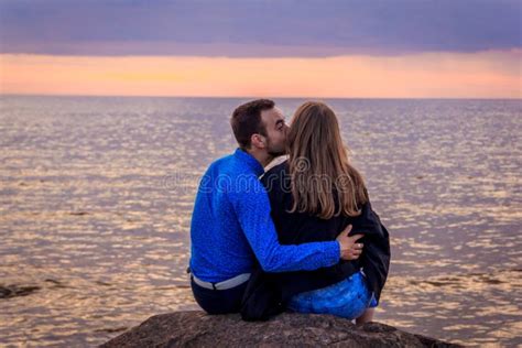 Couple In Love At Sunset By The Sea Stock Image Image Of Dating