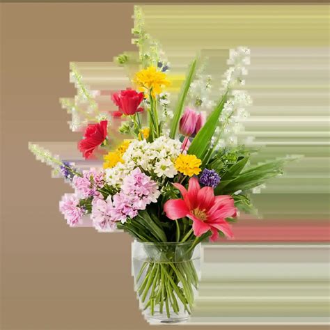 Exquisite Bouquet Of Random Flowers In A Clear Glass Vase Captivating